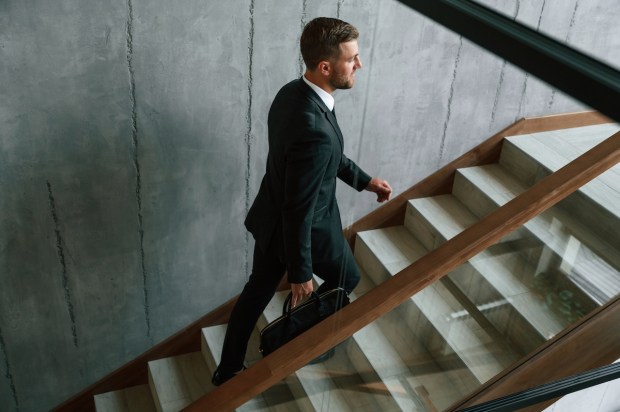 man-climbing-the-stairs
