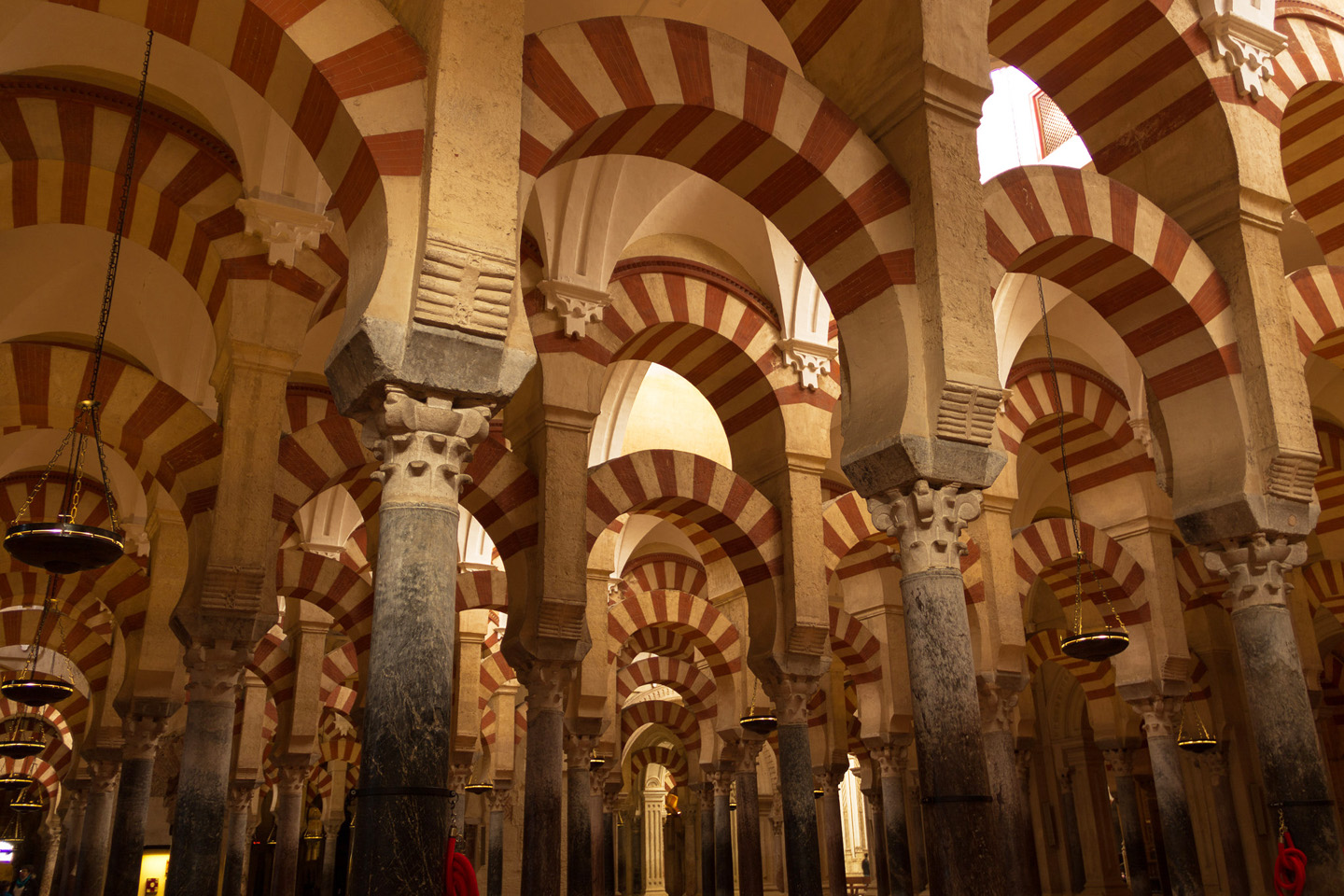 Se empezó a construir como mezquita en el año 785, con la apropiación y reutilización de los materiales de la basílica hispano-romana de San Vicente Mártir, que se hallaba en su lugar, por los conquistadores musulmanes. Tras la reconquista cristiana de Córdoba en 1236, Fernando III de Castilla convirtió la mezquita en catedral. 