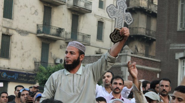 web-middle-east-muslim-christians-copt-egypt-protest-cross-omar-robert-hamilton-cc.jpg