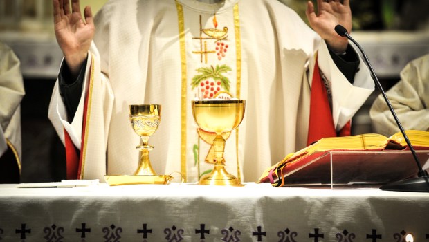 PRIEST WITH ALTER