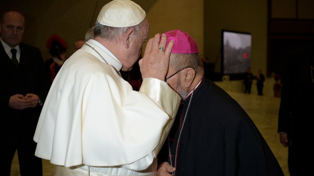 POPE FRANCIS BLESSES MSGR. ANTHONY SABLAN APURON