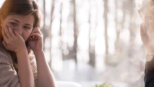 WOMAN CRYING,