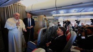 Pope-Francis-addresses-journalists-as-he-boards-a-flight-to-Edmonton-International-Airport-in-Alberta-western-Canad-AFP