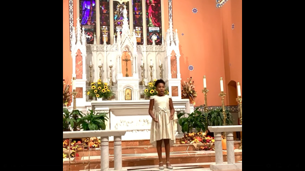 Girl singing altar