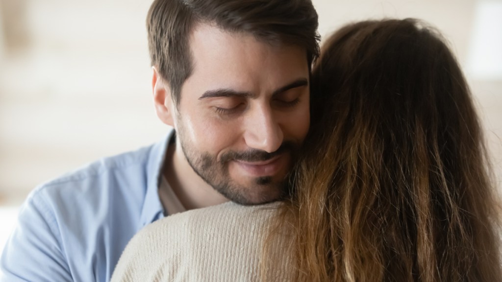 Couple hug forgive