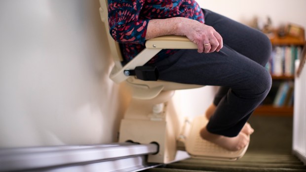 woman riding chair lift