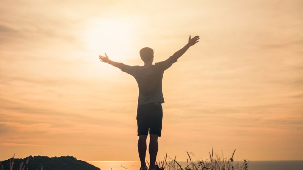 PRAY-MAN-BACK-shutterstock_533133535.jpg