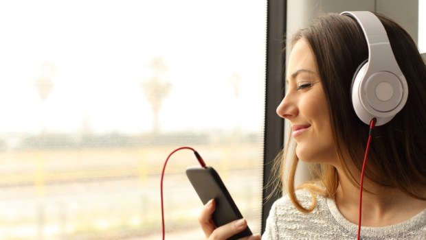 woman listening music cask
