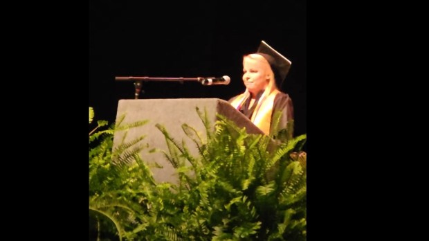 Ashley Payne addressing graduation ceremony