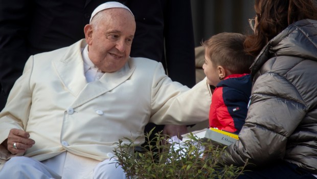 Pope Francis meets with faithful at the end of his weekly general audience in Saint Peter's square at the Vatican