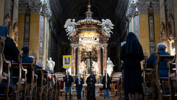 Via Crucis procession with torches organized by the Parish Sanctuary of Santa Maria in Traspontina near the Vatican