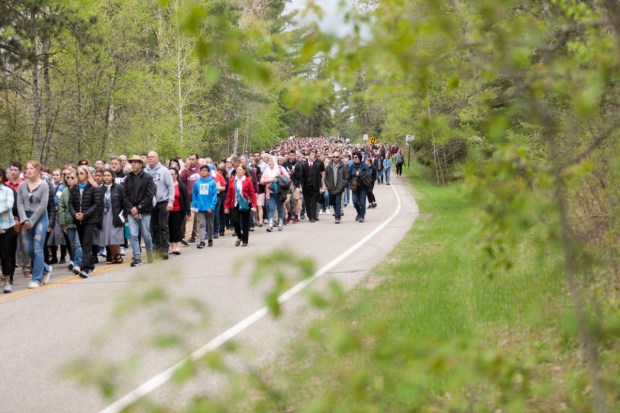People follow Eucharistic procession